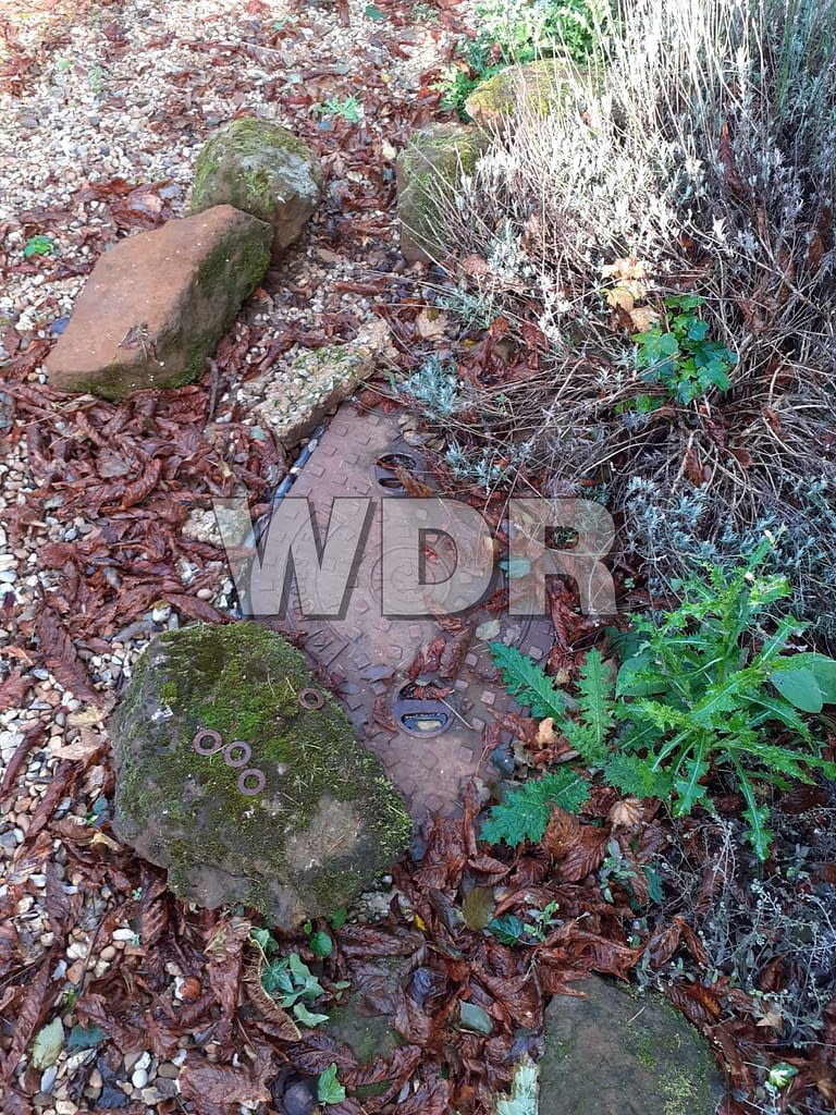 old manhole cover